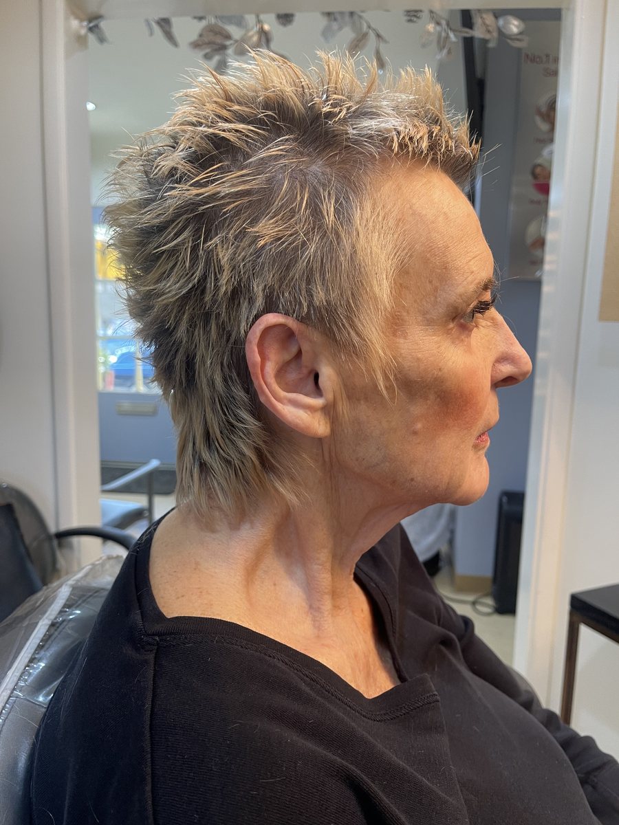 The same client with her hair grown out and styled