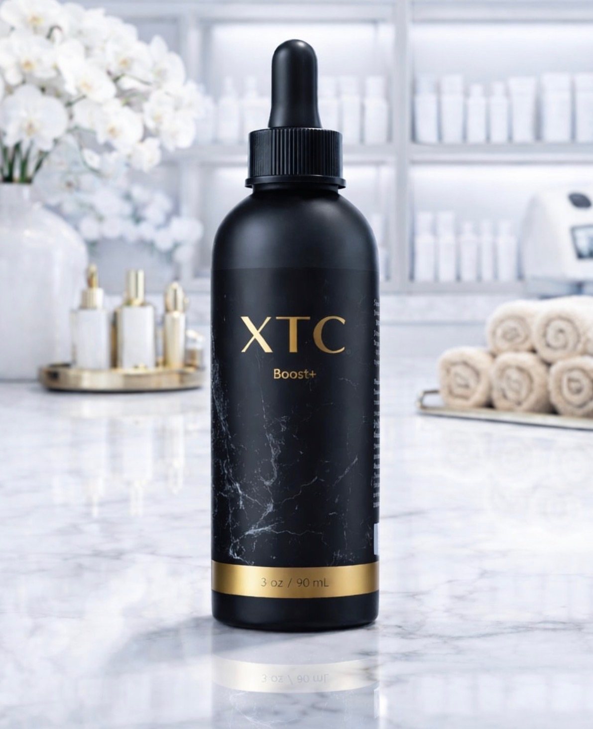 XTC Boost+ scalp topical in a black dropper bottle with a gold label